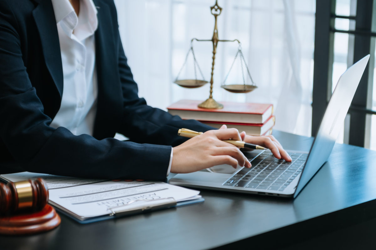 justice and law concept.male judge in a courtroom on wooden tabl